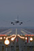 SAS plane about to land in Copenhagen with the approach light system and runway lights turned on