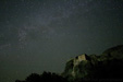 Night sky with the Mily Way and a monastery in Meteor