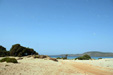 Night sky (full moon) with star trails on a beach in Elafonisos