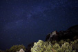 Night sky with the Mily Way and a monastery in Meteora