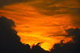 Sunset behind a building thunderstorm over the NY Yankees Stadium in New York